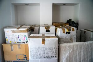 A room full of moving boxes.